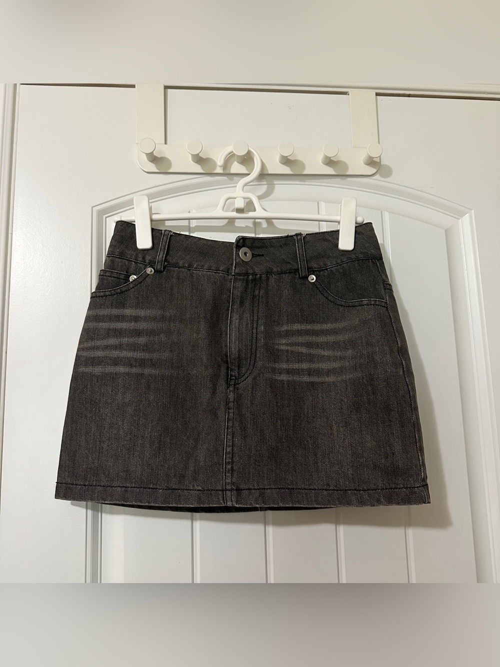 Wash Black denim mini skort with horizontal fadind